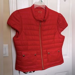 Nicki Minaj, Orange Muscle Sleeve Puffer Vest with Goldtone trims. X-Large.